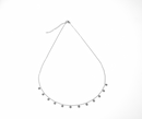 Gold colored charm necklace
