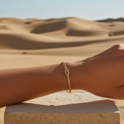 Luxe knoop armband goud